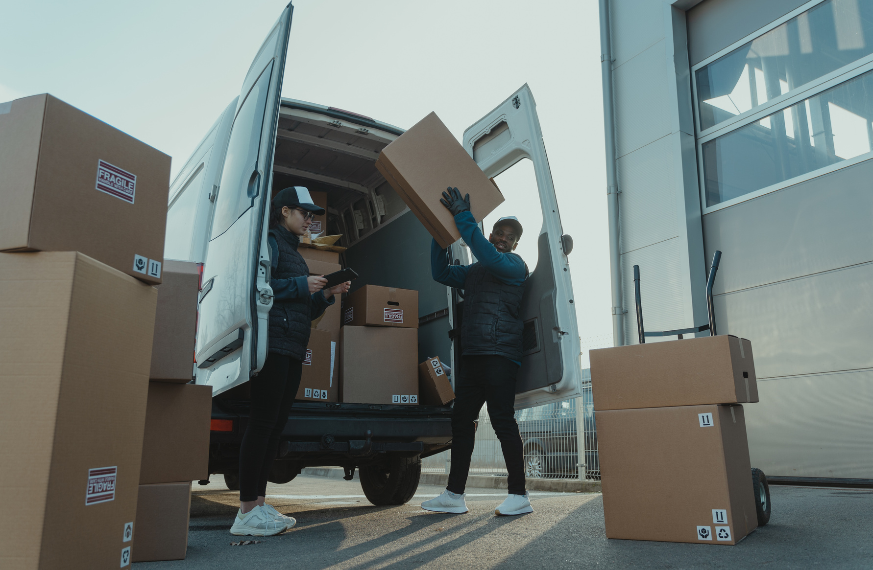 Delivery Man carrying Boxes